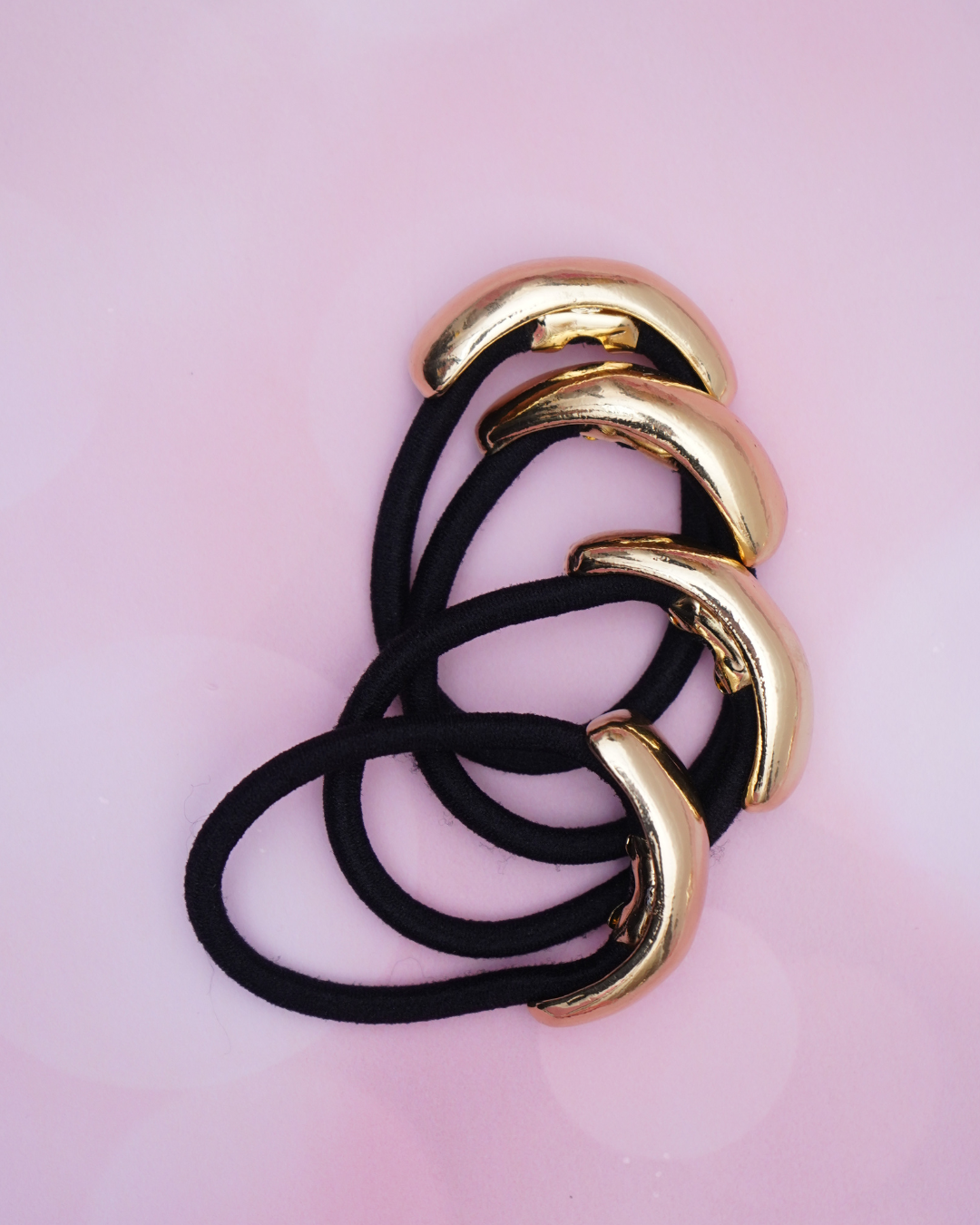 Set de 4 anillos para el cabello